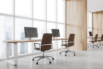 Fototapeta premium Light wooden open space office corner