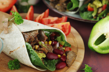Burrito - typical Texas and Mexican cuisine wrap dish