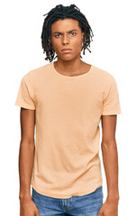 Young african american man wearing casual clothes skeptic and nervous, frowning upset because of problem. negative person.