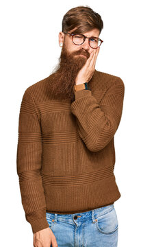 Young irish redhead man wearing casual clothes and glasses thinking looking tired and bored with depression problems with crossed arms.