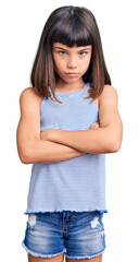 Young little girl with bang wearing casual clothes skeptic and nervous, disapproving expression on...