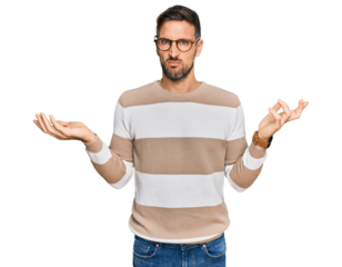 Handsome man with beard wearing casual clothes and glasses clueless and confused with open arms, no idea concept.