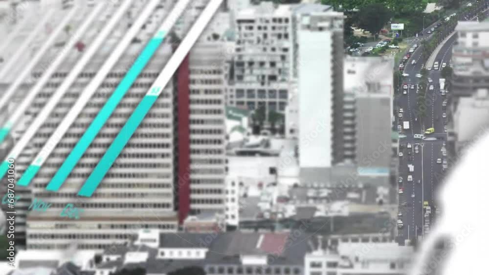 Poster animation of circle, graphs, globe and computer language over time lapse of moving vehicles in city