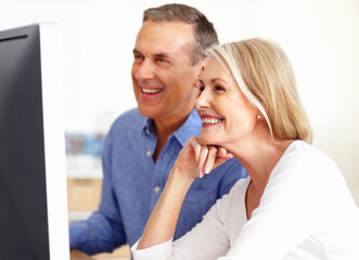 Search, senior or happy couple on computer for email, social media or streaming subscription in home. Smile, booking holiday vacation online or mature people on a website or internet in living room