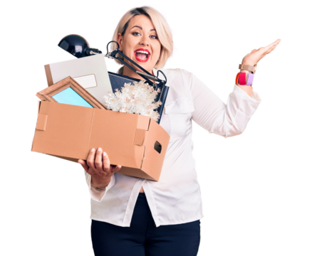 Young blonde plus size woman fired holding box celebrating victory with happy smile and winner expression with raised hands - Powered by Adobe