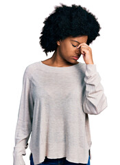 Young african american woman wearing casual clothes tired rubbing nose and eyes feeling fatigue and headache. stress and frustration concept.