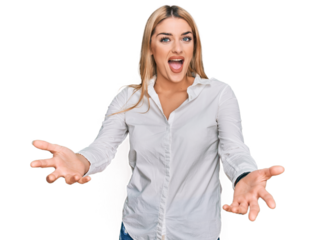 Young caucasian woman wearing casual clothes smiling cheerful offering hands giving assistance and acceptance.