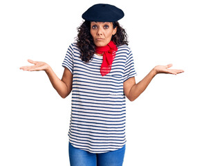 Middle age beautiful woman wearing french beret and scarf clueless and confused expression with...