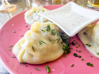 Traditional steamed dumplings Manti. Traditional Uzbek oriental cuisine. top view