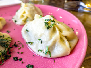 Traditional steamed dumplings Manti. Traditional Uzbek oriental cuisine. top view