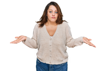 Young plus size woman wearing casual clothes clueless and confused expression with arms and hands raised. doubt concept.