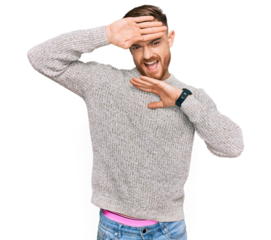 Young redhead man wearing casual winter sweater smiling cheerful playing peek a boo with hands showing face. surprised and exited