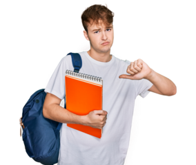 Young caucasian man wearing student backpack and holding books with angry face, negative sign showing dislike with thumbs down, rejection concept