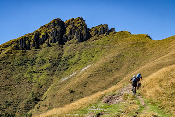 Fototapeta premium Cycling scene in the alps of Intelvi Valley