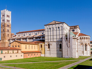 Fototapeta na wymiar The imposing church of Santa Maria Bianca and the gardens that surround it, Lucca, Tuscany, Italy