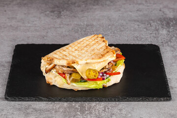 Turkish chicken doner sandwich. Fast food.Tortilla, burritos, sandwiches, twisted rolls
