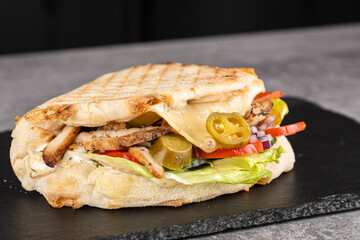 Turkish chicken doner sandwich. Fast food.Tortilla, burritos, sandwiches, twisted rolls