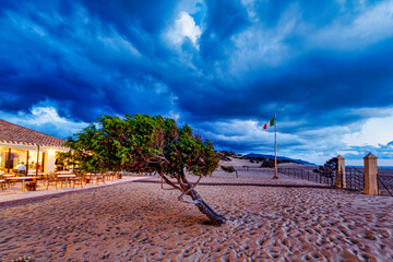 Sunset on the beach of Piscinas in the municipality of Arbus Sardinia is made up of 28 kilometers...