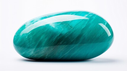 a smooth turquoise blue stone, isolated against a clean white backdrop, its calming color and polished surface creating a visually soothing and serene composition.