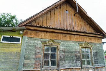 Old dilapidated wooden house.