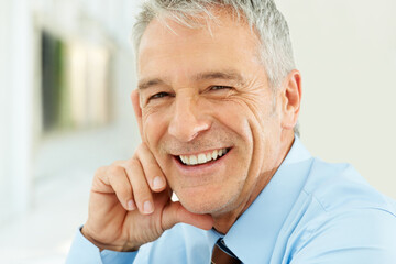 Smile, confident and portrait of mature businessman in the office with positive and good attitude....