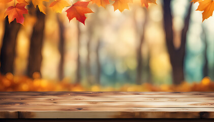 Naklejka na ściany i meble Empty wooden table on abstract autumn background for product presentation - space for a montage showing the product.