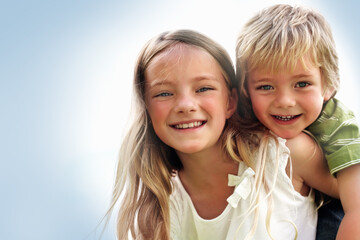 Siblings, sister and brother or portrait with piggyback for bonding, relationship and freedom with...