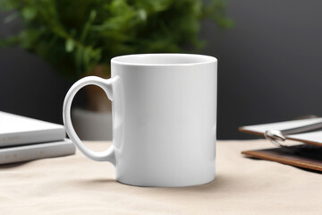 The layout of the white mug is on the table