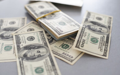 One hundred dollars pile close-up.