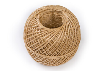 Skein of brown synthetic twine on a white background