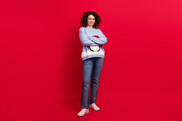Full length photo of good mood confident lady wear ugly new year pullover smiling arms crossed...