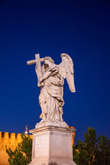 Angel with Cross Statue on Ponte Sant'Angelo in Rome, Italy	

