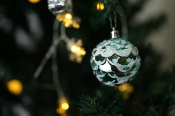 Merry Christmas 2024 concept Christmas balls are used to decorate the Christmas tree at family parties.