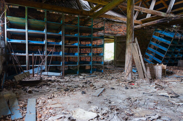 Devastation in premises of former mechanized yard of state farm in resettled village of Pogonnoye in Chernobyl exclusion zone, Belarus