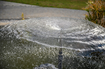 circle of water from a fountain spraying water 2