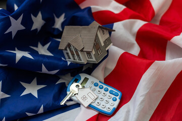 House with American flag. American Real Estate concept. United States Housing Market Concepts. 