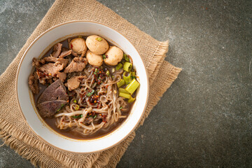 Thai noodle with pork, stewed pork, meatball and pork liver in blood soup