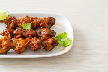 grilled chicken gizzard skewer with herbs and spices