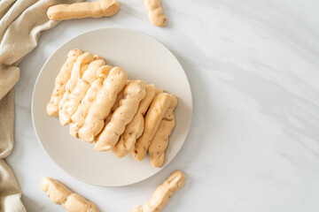 almonds meringue stick on plate