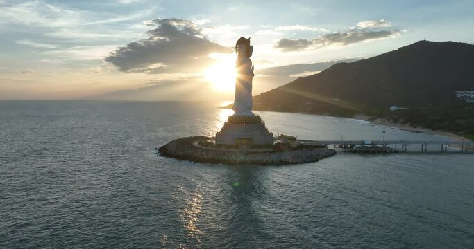 Aerial footage of Guanyin statue at seaside in nanshan temple, hainan island , China
