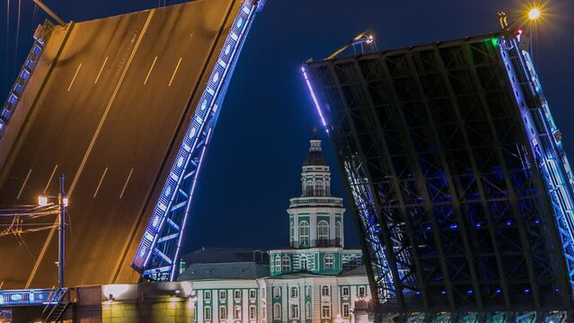 Raised Palace Bridge timelapse amid numerous boats and the prominent Kunstkamera - Museum of Anthropology and Ethnography. Overlooking the Neva River, scene embodies St. Petersburg's charm. Russia
