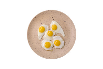 Delicious nutritious breakfast of fried quail eggs, bacon, legumes and cherry tomatoes
