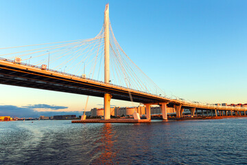 Cable-stayed bridge Western high-speed diameter across Peter's fairway in St. Petersburg at sunset, Russia