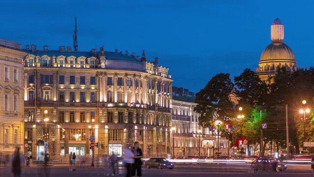 View of Saint Isaac's Cathedral timelapse from Palace Square with Traffic in Saint Petersburg, Russia. The City's Largest Cathedral, Completed in 1858, Shines Amidst the Night