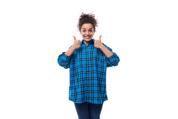 Fototapeta premium portrait of a young pretty woman with curled hair smiling on a white background