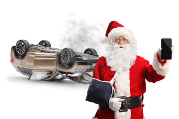 Santa Claus with an arm injury from a car accident showing a smartphone