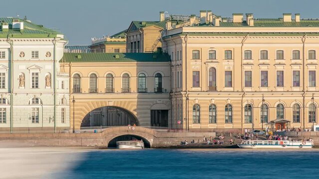 Hermitage Bridge Crowd: Timelapse of People on Bridge and Stairs by Neva River. Tourist Boat on Winter Canal (Zimnyaya Kanavka) in Background, St. Petersburg, Russia