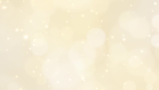 Abstract light blur bokeh glow gold gradient with particles glittering shine luxury background.  Gold glitter motion videos for wedding or valentine and christmas.
