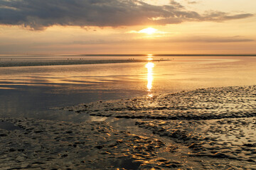 Wattenmeer, mud tideland in North Sea, Germany. Nordsee, Watt by sunset.