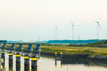 Berths with solar panels installed on them in a bay near the coast.